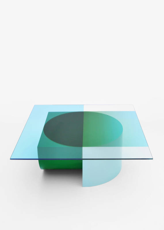 Design forward and beautiful low table for your home interior. COMPOSITION is a low table where the transparant colours of the glass top become more saturated or change colour where they overlap the base. The graphic design of the glass top follows the geometric shapes of the base. Colorful lowtable with a contemporary design. Available in various color combinations. Shipping worldwide. Made to order. A design that adds value to every modern and contemporary home and interior.