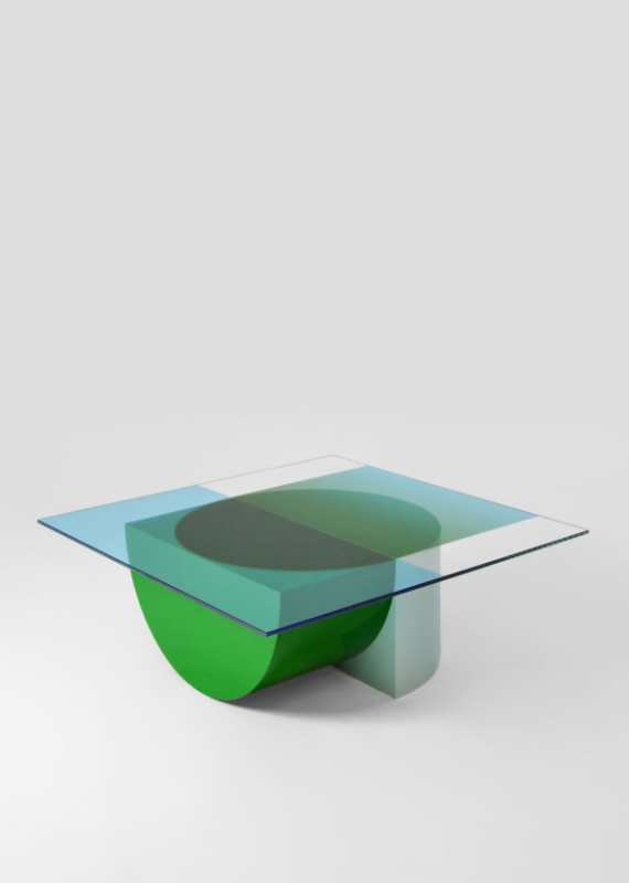Design forward and beautiful low table for your home interior. COMPOSITION is a low table where the transparant colours of the glass top become more saturated or change colour where they overlap the base. The graphic design of the glass top follows the geometric shapes of the base. Colorful lowtable with a contemporary design. Available in various color combinations. Shipping worldwide. Made to order. A design that adds value to every modern and contemporary home and interior.